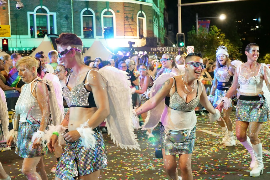A group of people wearing angel wings.