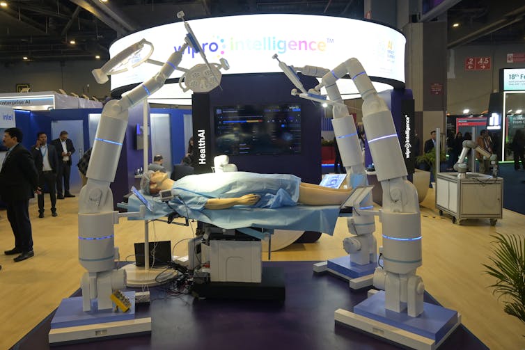Healthcare AI robots at a exhibition at the India AI Summit