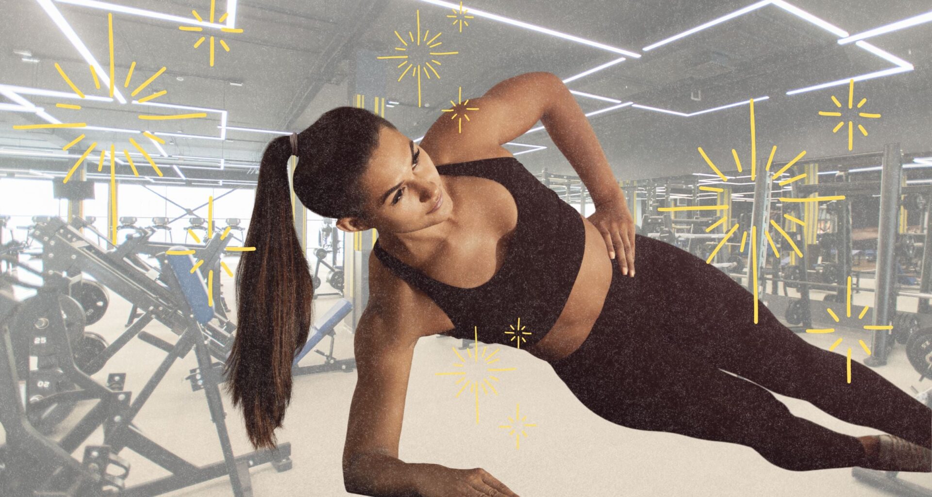 woman side planking at gym