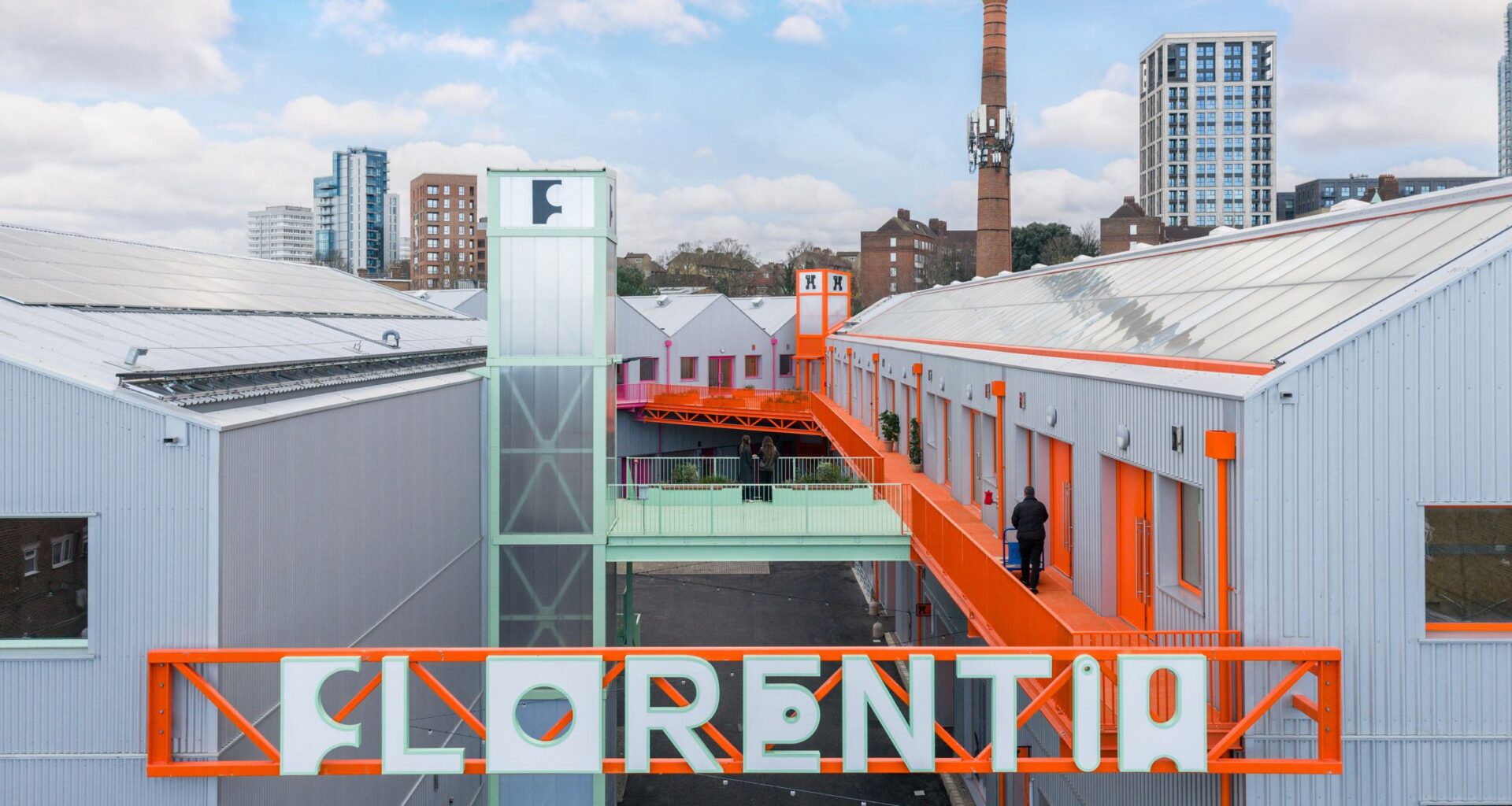 Florentia Village Turner Works bright orange sign