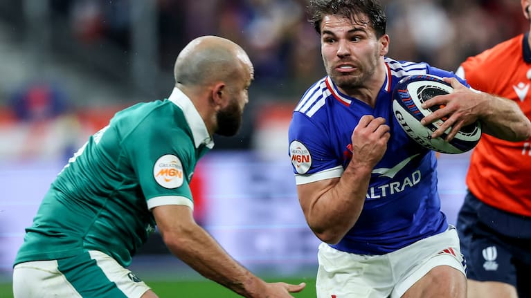 France halfback Antoine Dupont runs at Ireland counterpart Jamison Gibson-Park during France's opening Six Nations victory in Paris.