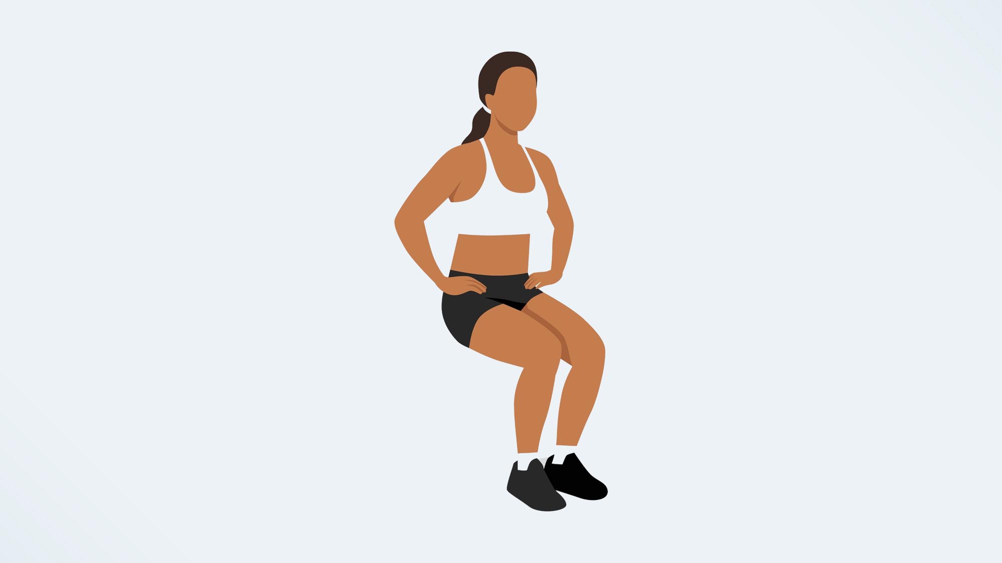 a woman doing a wall sit