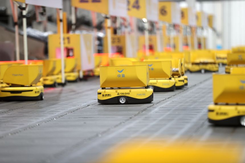 'Minions' robots sort express parcels at an intelligent logistics park to ensure smooth logistics before the Spring Festival in Huzhou, Zhejiang Province of China, on February 5, 2024.