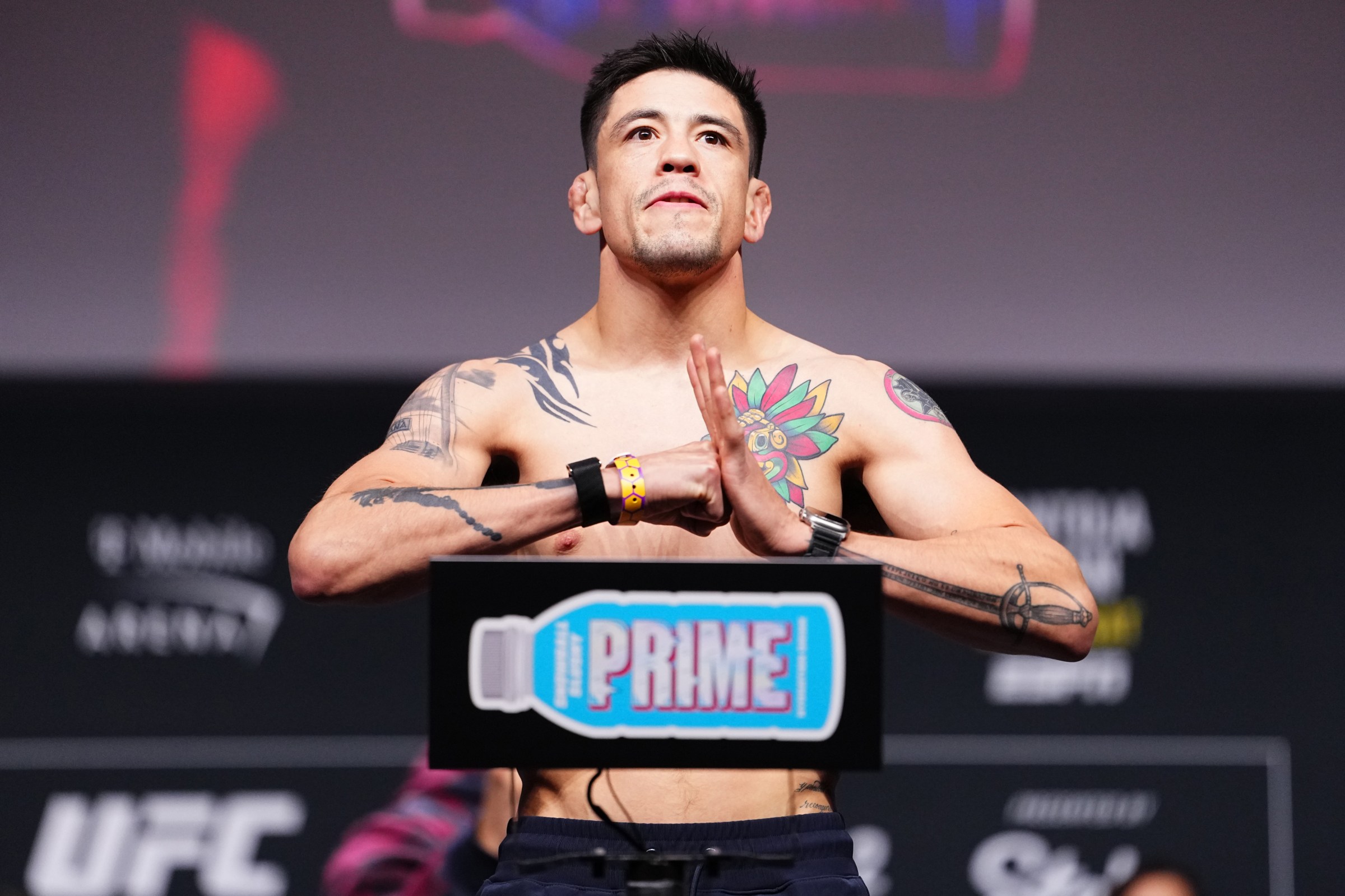 LAS VEGAS, NEVADA - DECEMBER 05: Brandon Moreno of Mexico poses on the scale during the UFC 323 ceremonial weigh-in at T-Mobile Arena on December 05, 2025 in Las Vegas, Nevada. (Photo by Jeff Bottari/Zuffa LLC)