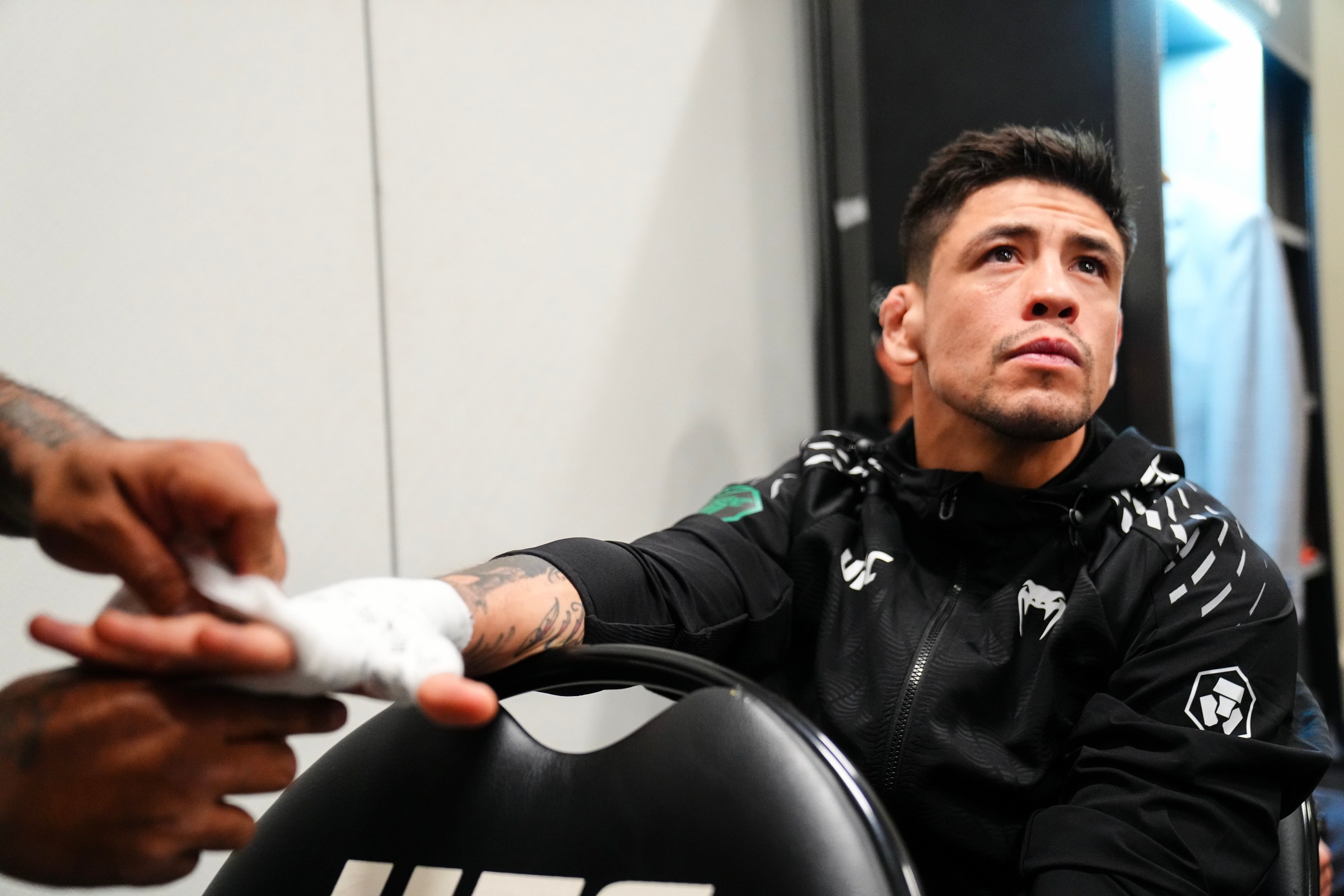 LAS VEGAS, NEVADA - DECEMBER 06: Brandon Moreno of Mexico has his hands wrapped prior to his fight during the UFC 323 event at T-Mobile Arena on December 06, 2025 in Las Vegas, Nevada. (Photo by Mike Roach/Zuffa LLC)