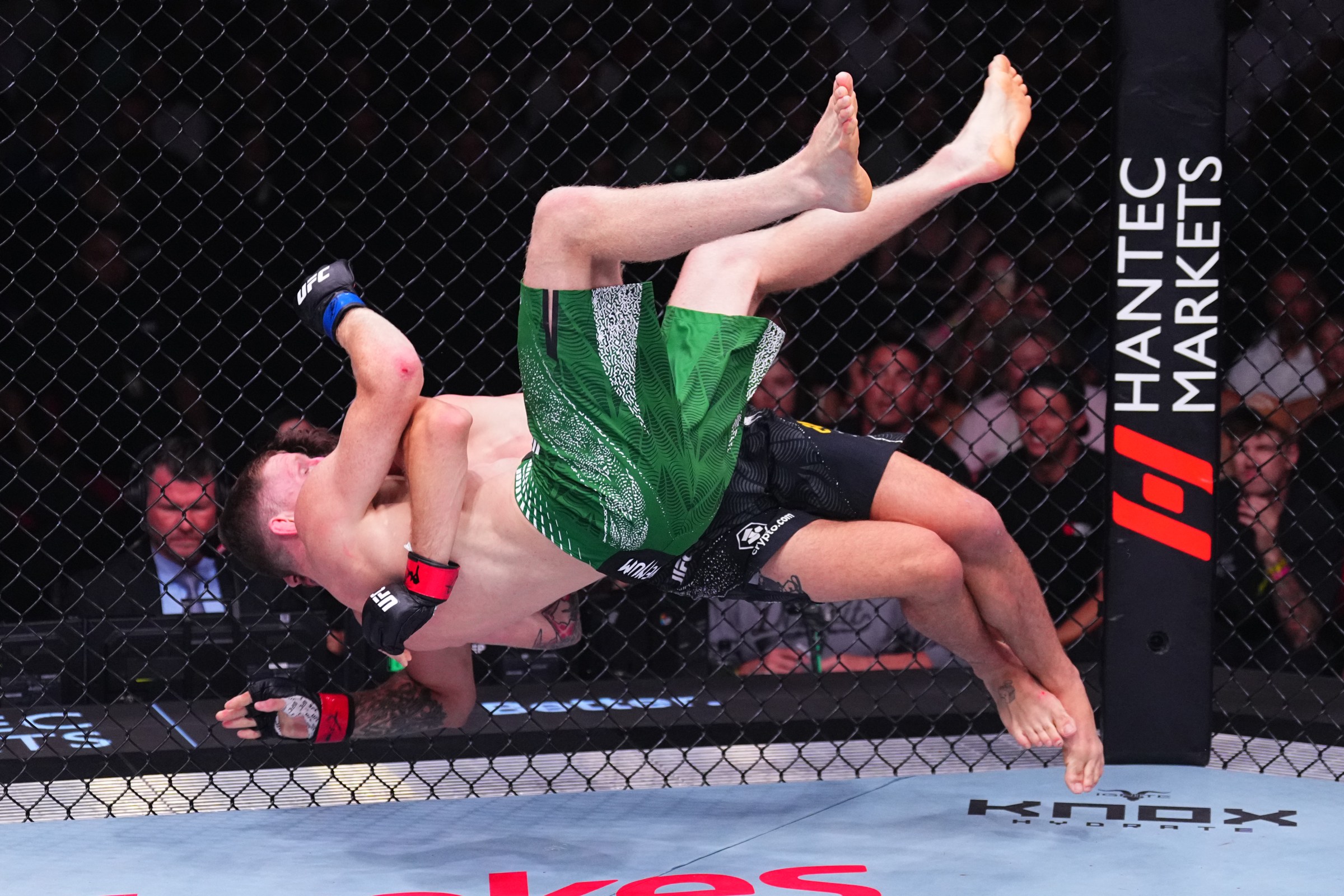 SYDNEY, AUSTRALIA - FEBRUARY 01: (R-L) Quillan Salkilld of Australia takes down Jamie Mullarkey of Australia in a lightweight fight during the UFC 325 event at Qudos Bank Arena on February 01, 2026 in Sydney, Australia. (Photo by Jeff Bottari/Zuffa LLC)