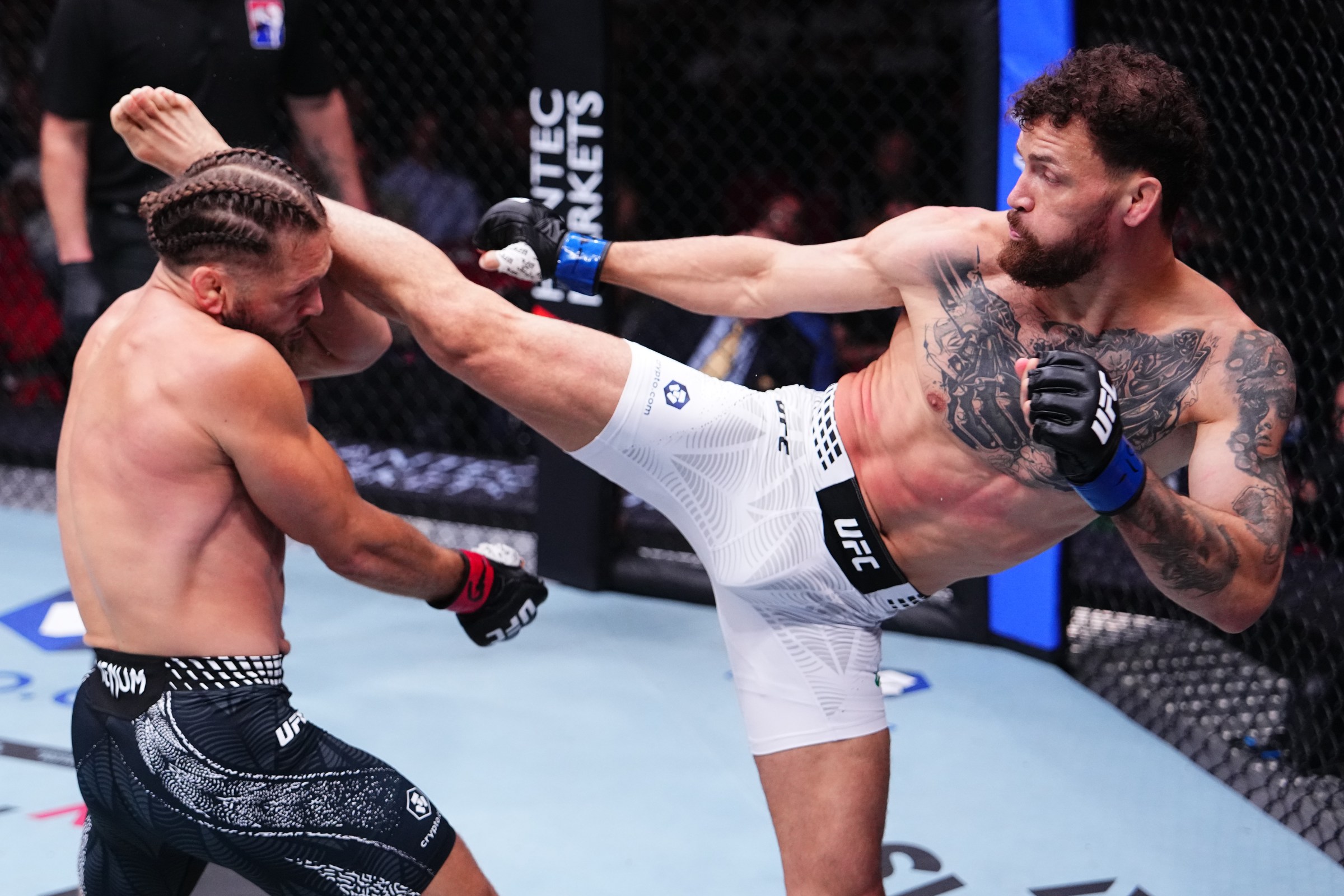 SYDNEY, AUSTRALIA - FEBRUARY 01: (R-L) Mauricio Ruffy of Brazil kicks Rafael Fiziev of Kazakstan in a lightweight fight during the UFC 325 event at Qudos Bank Arena on February 01, 2026 in Sydney, Australia. (Photo by Jeff Bottari/Zuffa LLC)