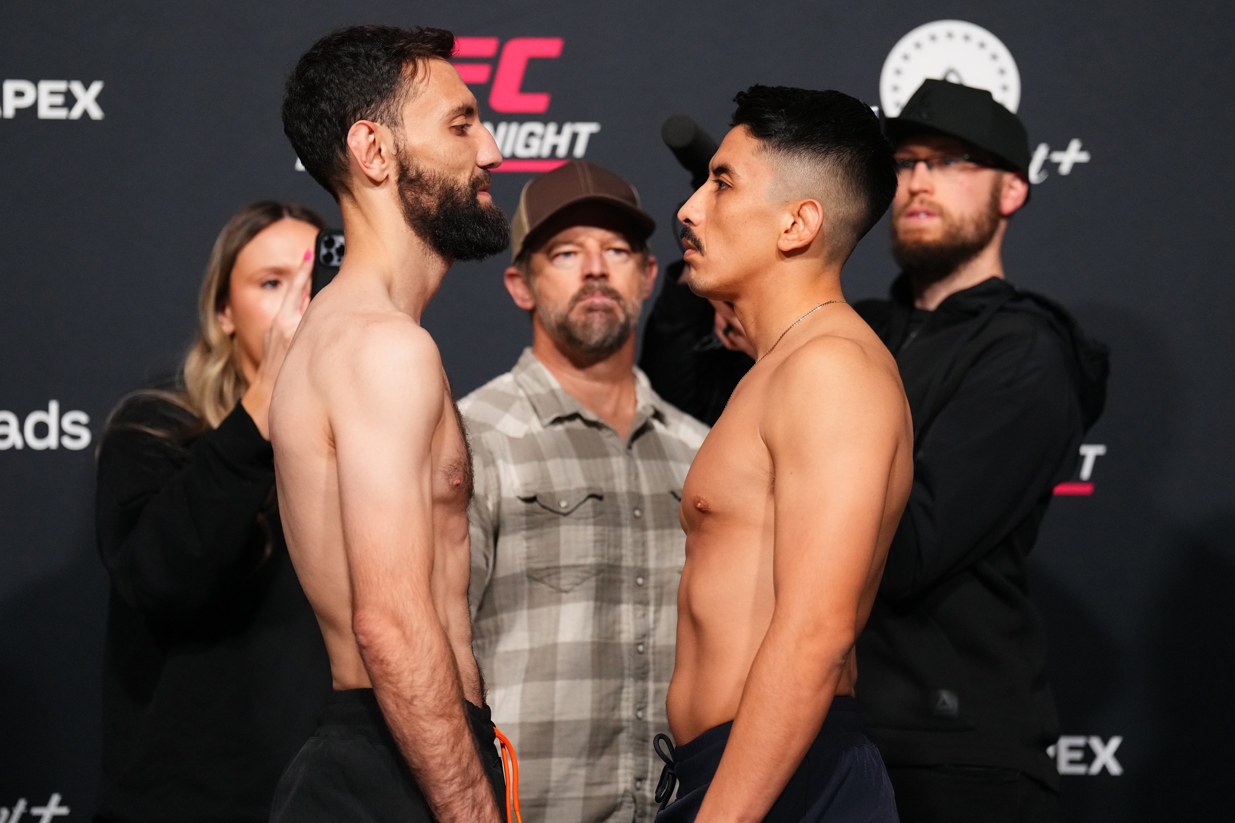 LAS VEGAS, NEVADA - FEBRUARY 06: (L-R) Javid Basharat of Afghanistan and Gianni Vazquez of Mexico face off during the UFC Fight Night weigh-in at Meta APEX on February 06, 2026 in Las Vegas, Nevada. (Photo by Chris Unger/Zuffa LLC)