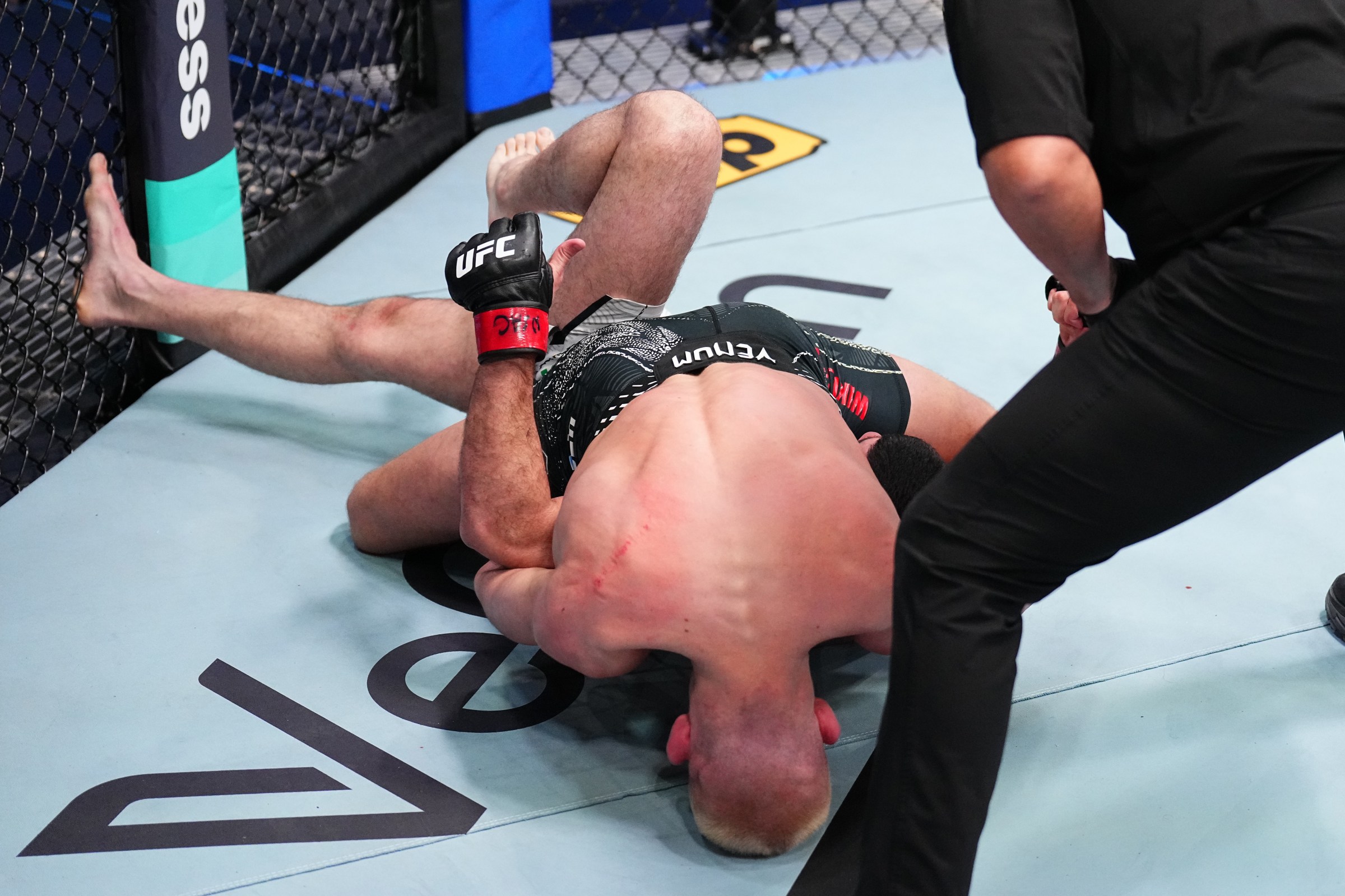 LAS VEGAS, NEVADA - FEBRUARY 07: (L-R) Jakub Wiklacz of Poland submits Muin Gafurov of Tajikistan in a bantamweight fight during the UFC Fight Night event at Meta APEX on February 07, 2026 in Las Vegas, Nevada. (Photo by Chris Unger/Zuffa LLC)