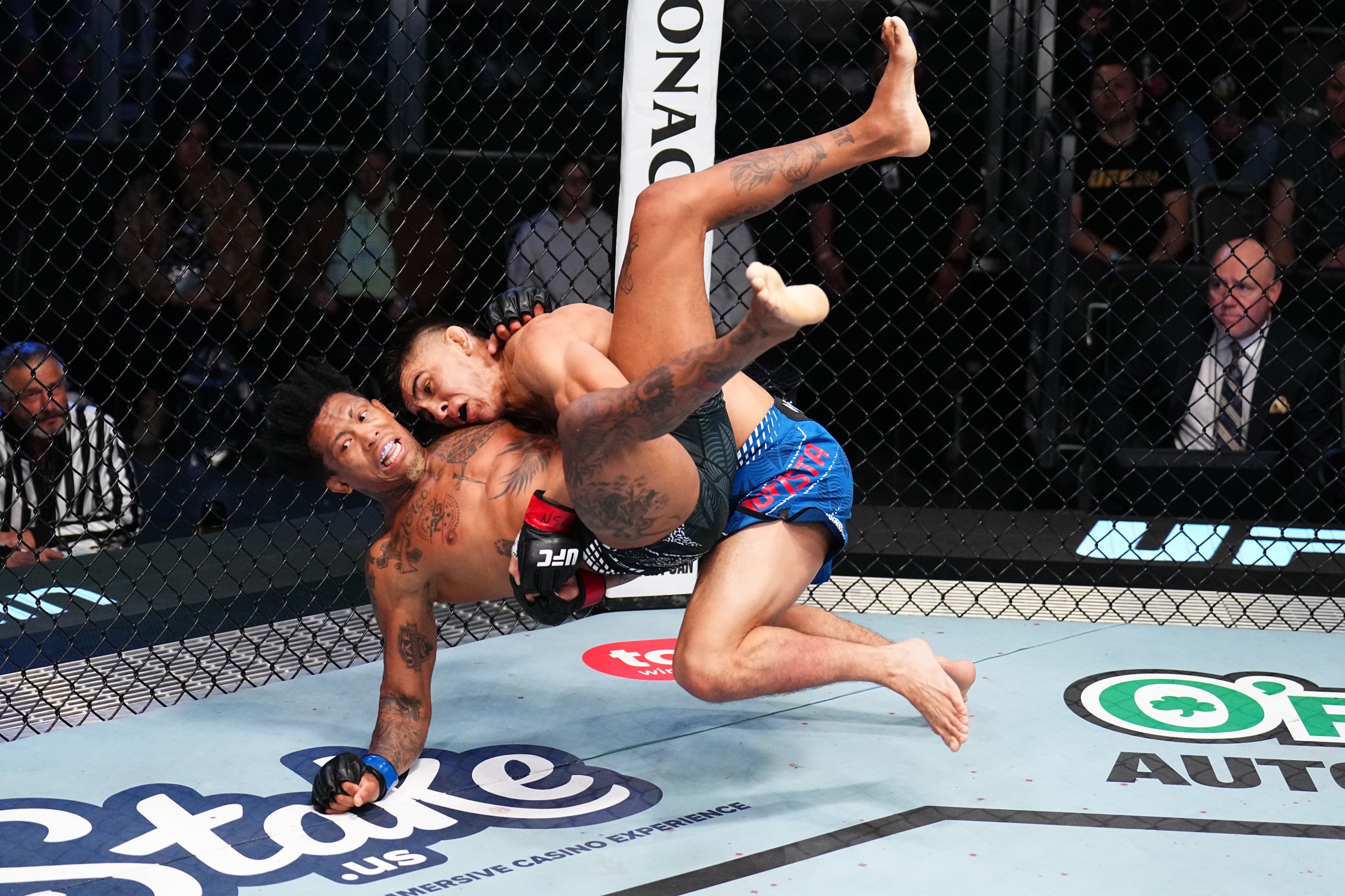 LAS VEGAS, NEVADA - FEBRUARY 07: (R-L) Mario Bautista takes down Vinicius Oliveira of Brazil in a bantamweight fight during the UFC Fight Night event at Meta APEX on February 07, 2026 in Las Vegas, Nevada. (Photo by Chris Unger/Zuffa LLC)