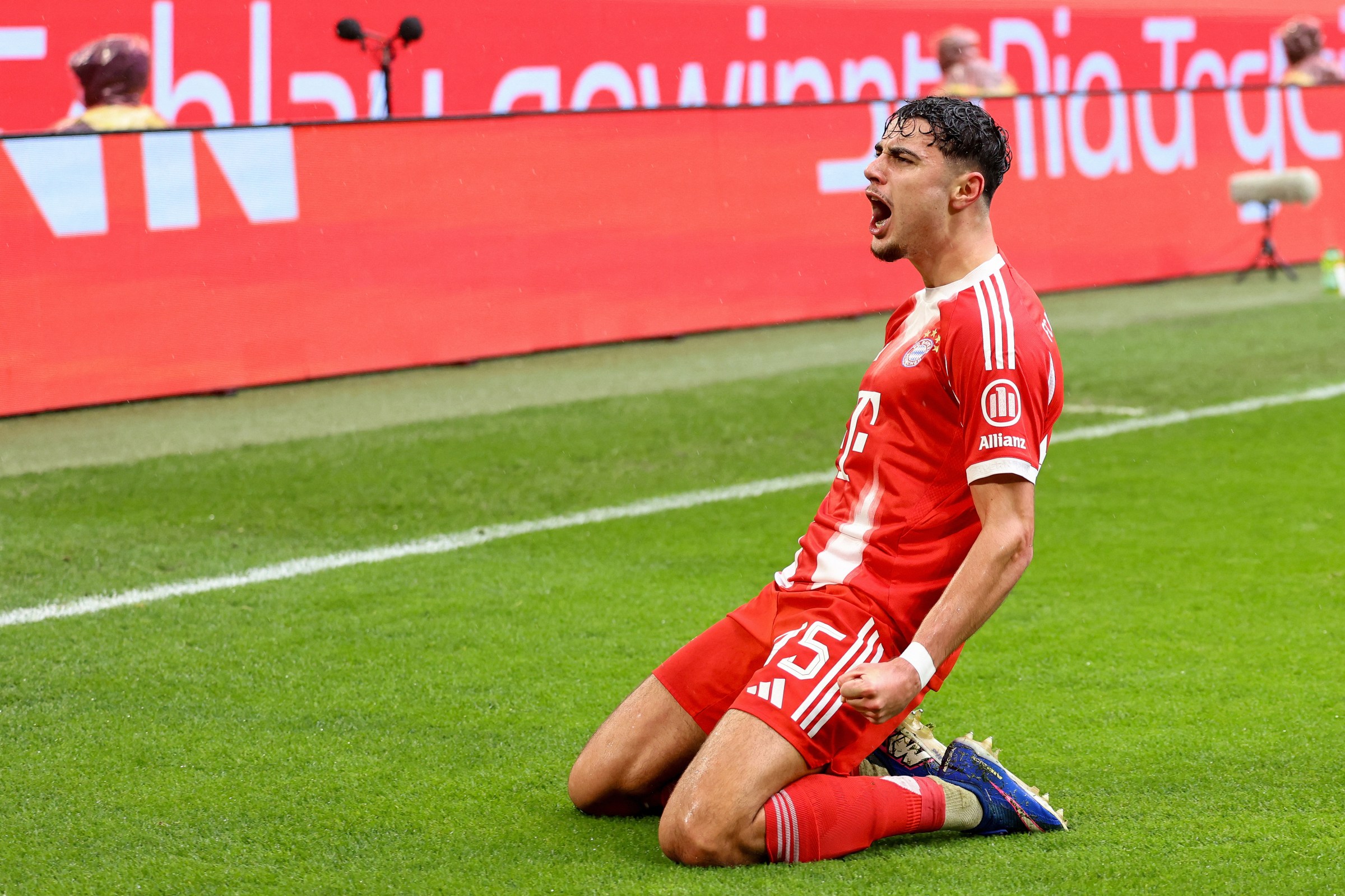 Bayern Munich’s German midfielder #45 Aleksandar Pavlovic celebrates scoring the opening goal during the German first division Bundesliga football match between FC Bayern Munich and Eintracht Frankfurt in Munich, southern Germany, on February 21, 2026. (Photo by Alexandra BEIER / AFP via Getty Images) / DFL REGULATIONS PROHIBIT ANY USE OF PHOTOGRAPHS AS IMAGE SEQUENCES AND/OR QUASI-VIDEO