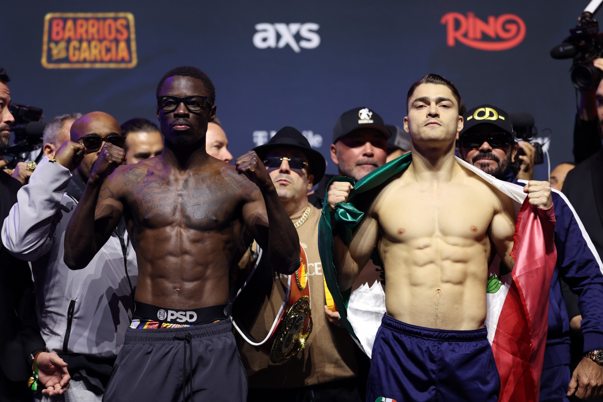 LAS VEGAS, NEVADA - FEBRUARY 20: Richardson Hitchins (L) and Oscar Duarte (R) face off during weigh ins ahead of their IBF Super Lightweight title bout at T-Mobile Arena on February 20, 2026 in Las Vegas, Nevada. (Photo by Cris Esqueda/Golden Boy/Getty Images)