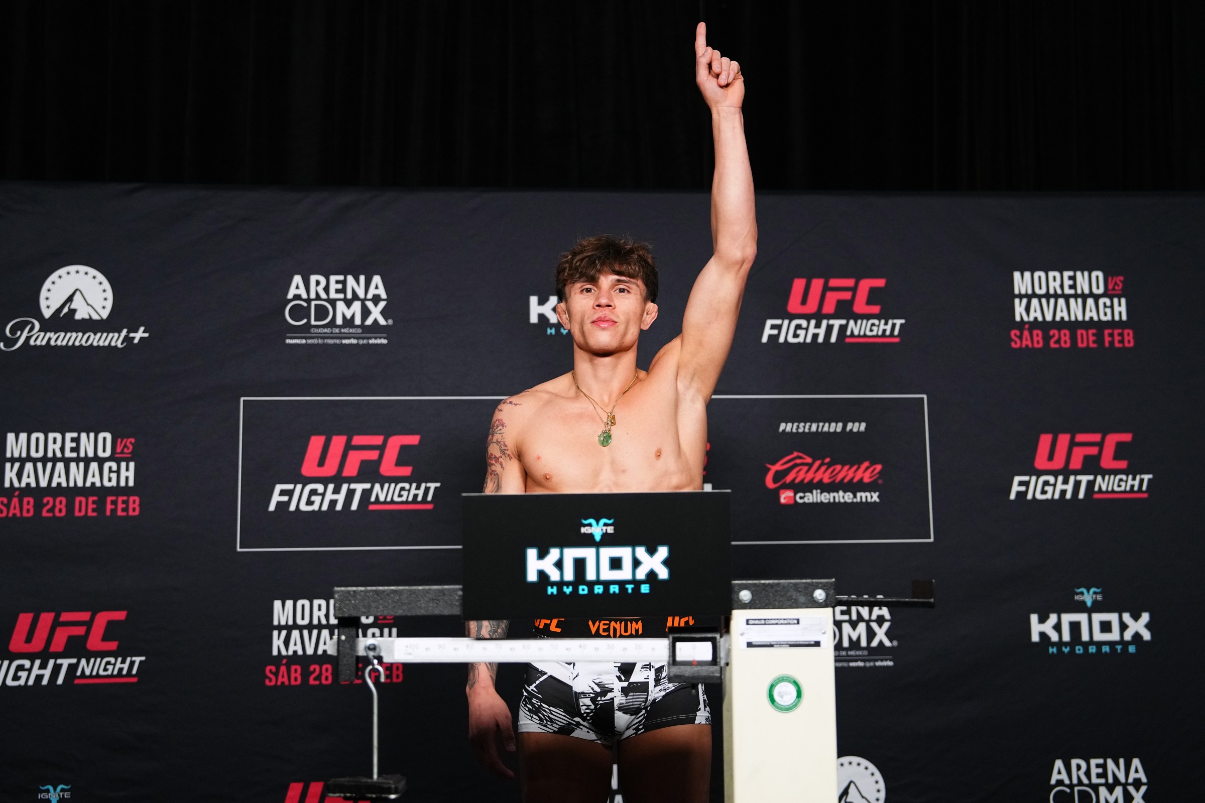 MEXICO CITY, MEXICO - FEBRUARY 27: Lone’er Kavanagh of England poses on the scale during the UFC Fight Night official weigh-in at InterContinental Mexico City on February 27, 2026 in Mexico City, Mexico. (Photo by Jeff Bottari/Zuffa LLC)