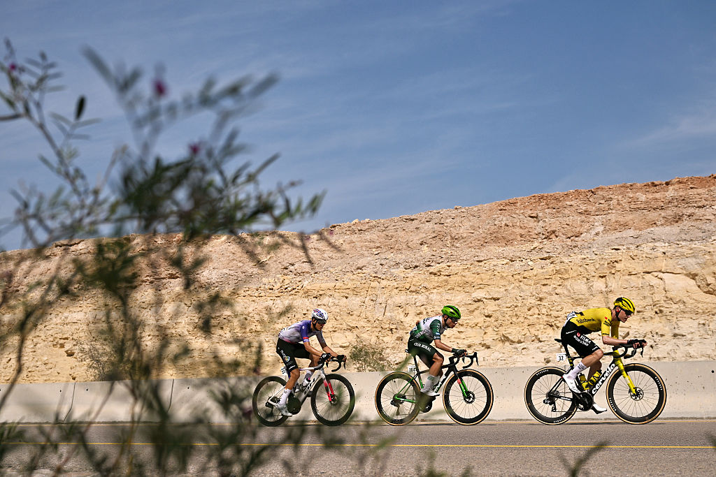 BIMMAH SINKHOLE, OMAN - FEBRUARY 07: A general view of Patryk Goszczurny of Poland and Team Visma | Lease a Bike, Jose Luis Faura Asensio of Spain and Team Burgos-Burpellet-BH and Alex Diaz Alvarez of Chile and Team Caja Rural-Seguros RGA compete in the breakaway during the 15th Tour of Oman 2026, Stage 1 a 170.9km stage from Ministry of Tourism to Bimmah Sink Hole on February 07, 2026 in Bimmah sinkhole, Oman. (Photo by Dario Belingheri/Getty Images)