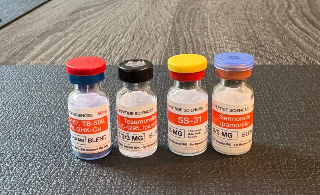 Four vials from Peptide Sciences containing various peptide blends.