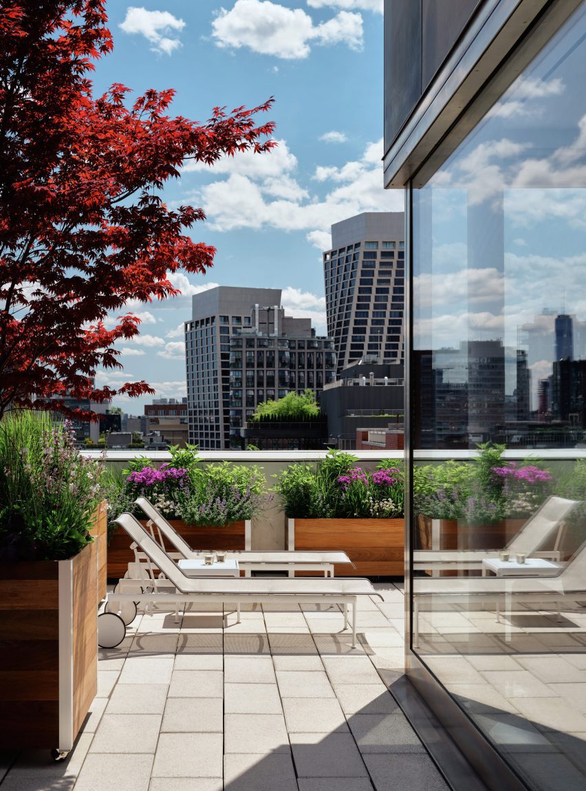 A wraparound terrace with a view of BIG's One High Line towers