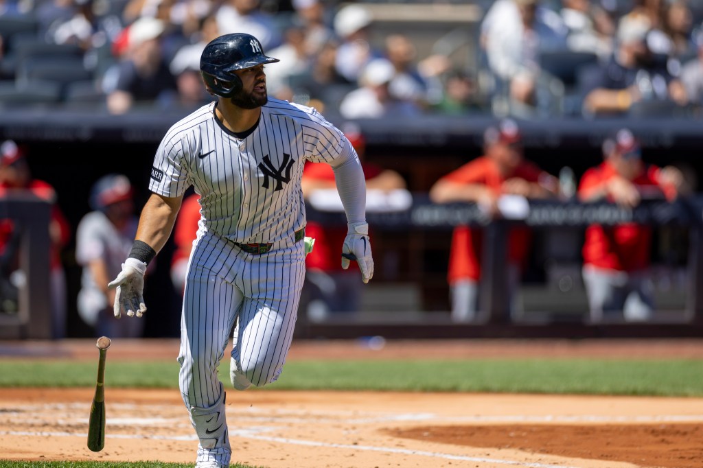 New York Yankees outfielder Jasson Domínguez (24) on the field at Yankee Stadium after hitting a ground-rule double.