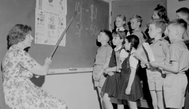 Search under way for former school children pictured in iconic 1965 photo before Changeover Day