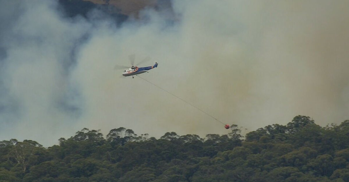 Firefighters prepare for gusty wind change as fire grows in central Victoria