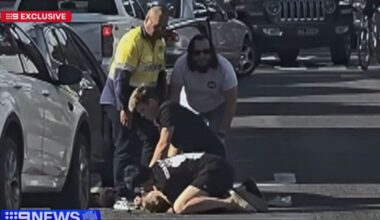 Shirtless driver pinned down in dramatic citizens' arrest on busy road