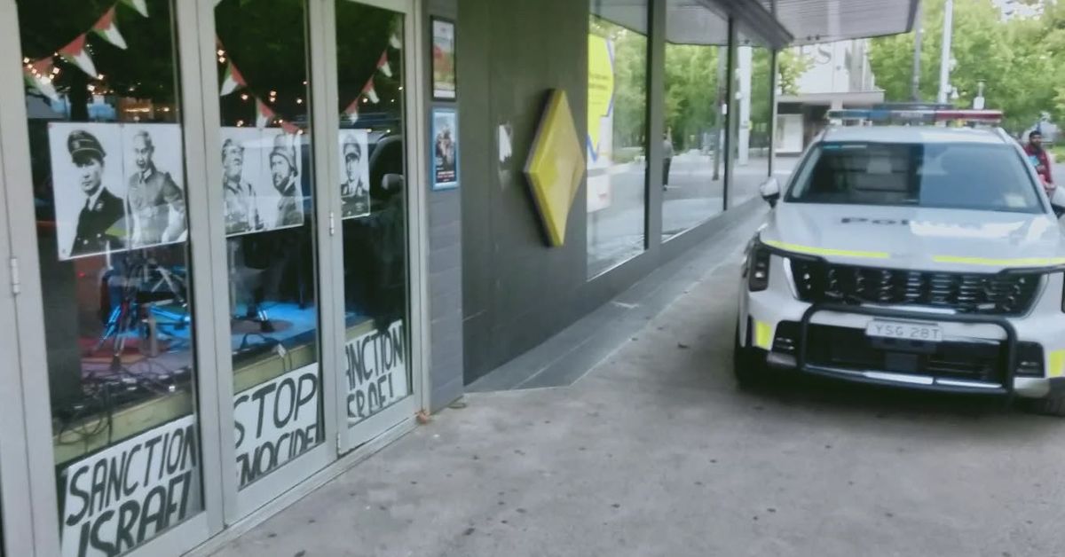 Dissent cafe and bar Canberra investigated under new hate laws over 'parody' posters