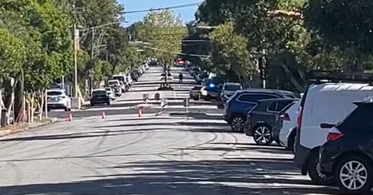 Man arrested after bomb scare beside two Melbourne schools