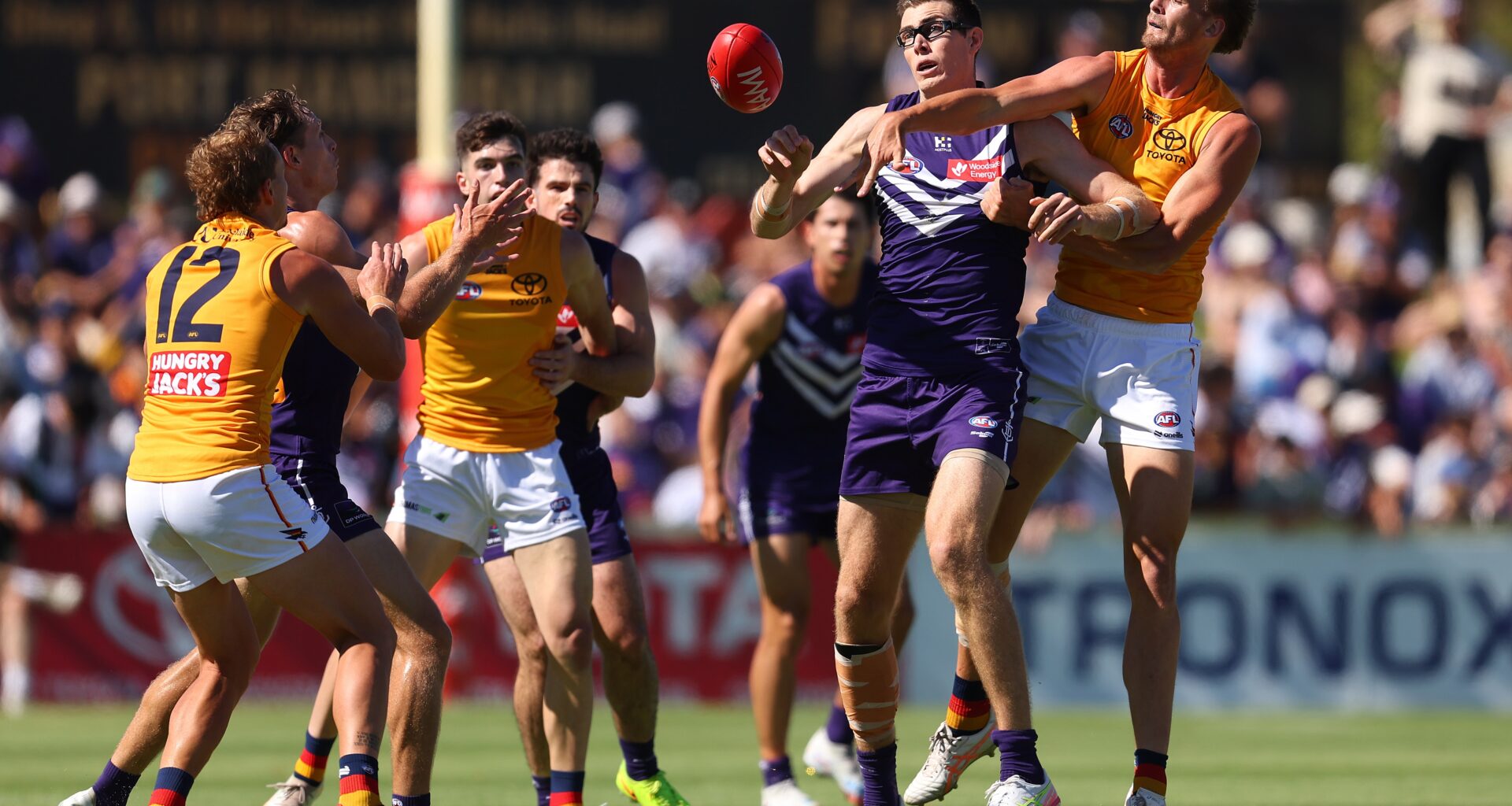 Dockers face ruck dilemma, young Crows impress