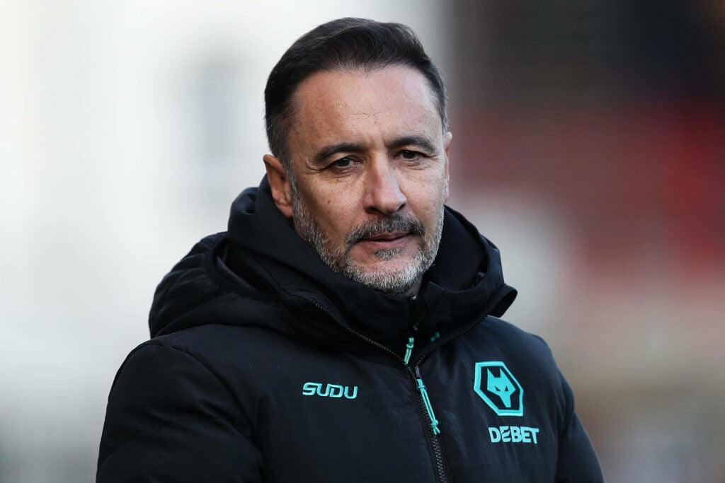 Wolves manager Vitor Pereira in black coat looking sad