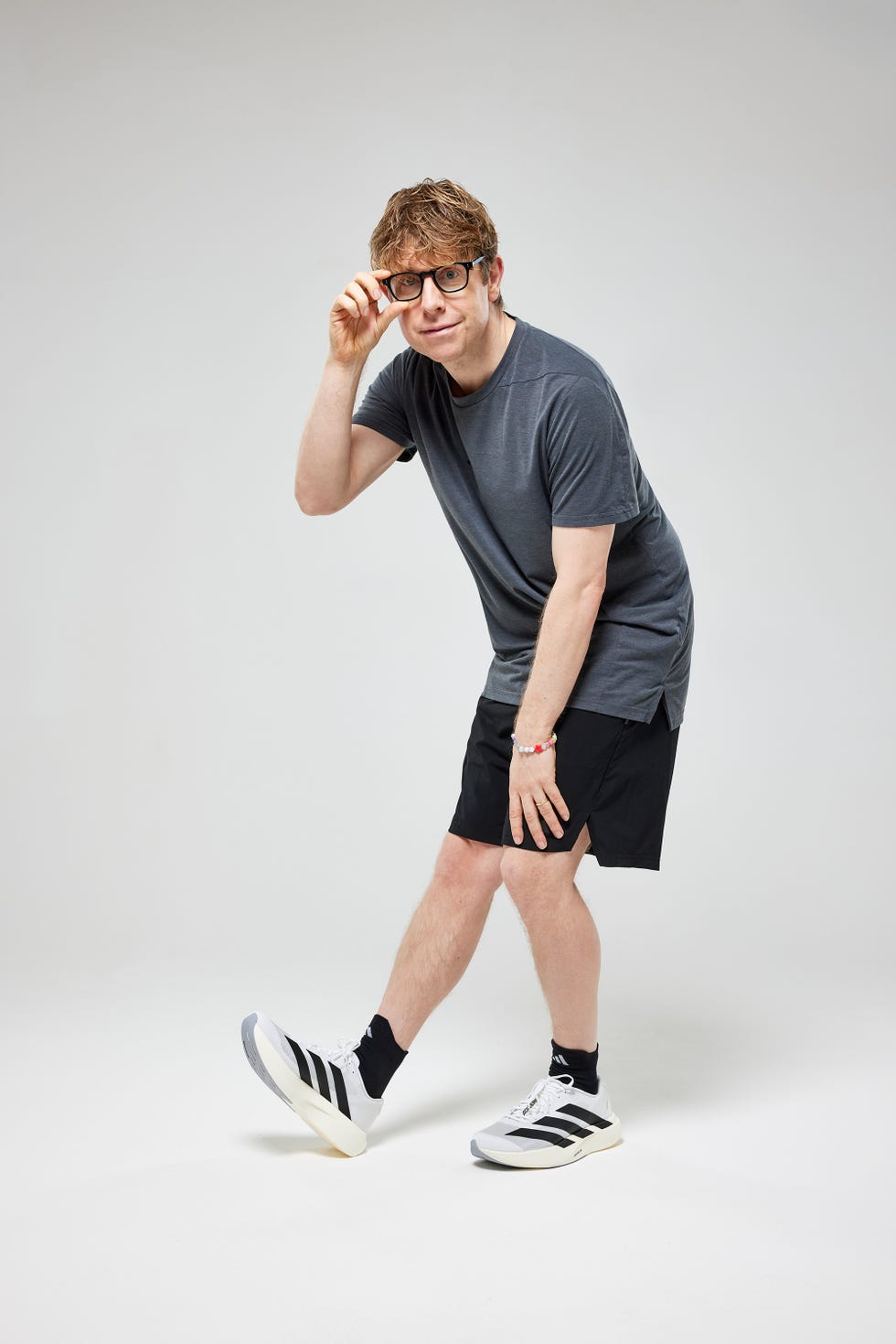 Josh Widdicombe person wearing athletic clothing posing energetically