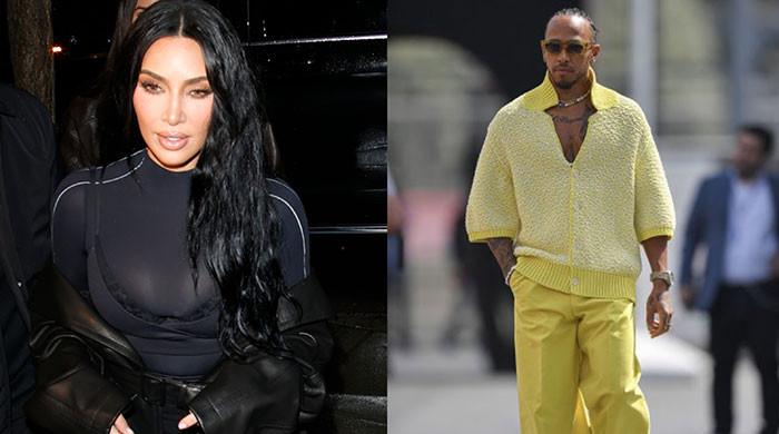 Kim Kardashian crashes hard into F1 champ Lewis Hamilton in Paris