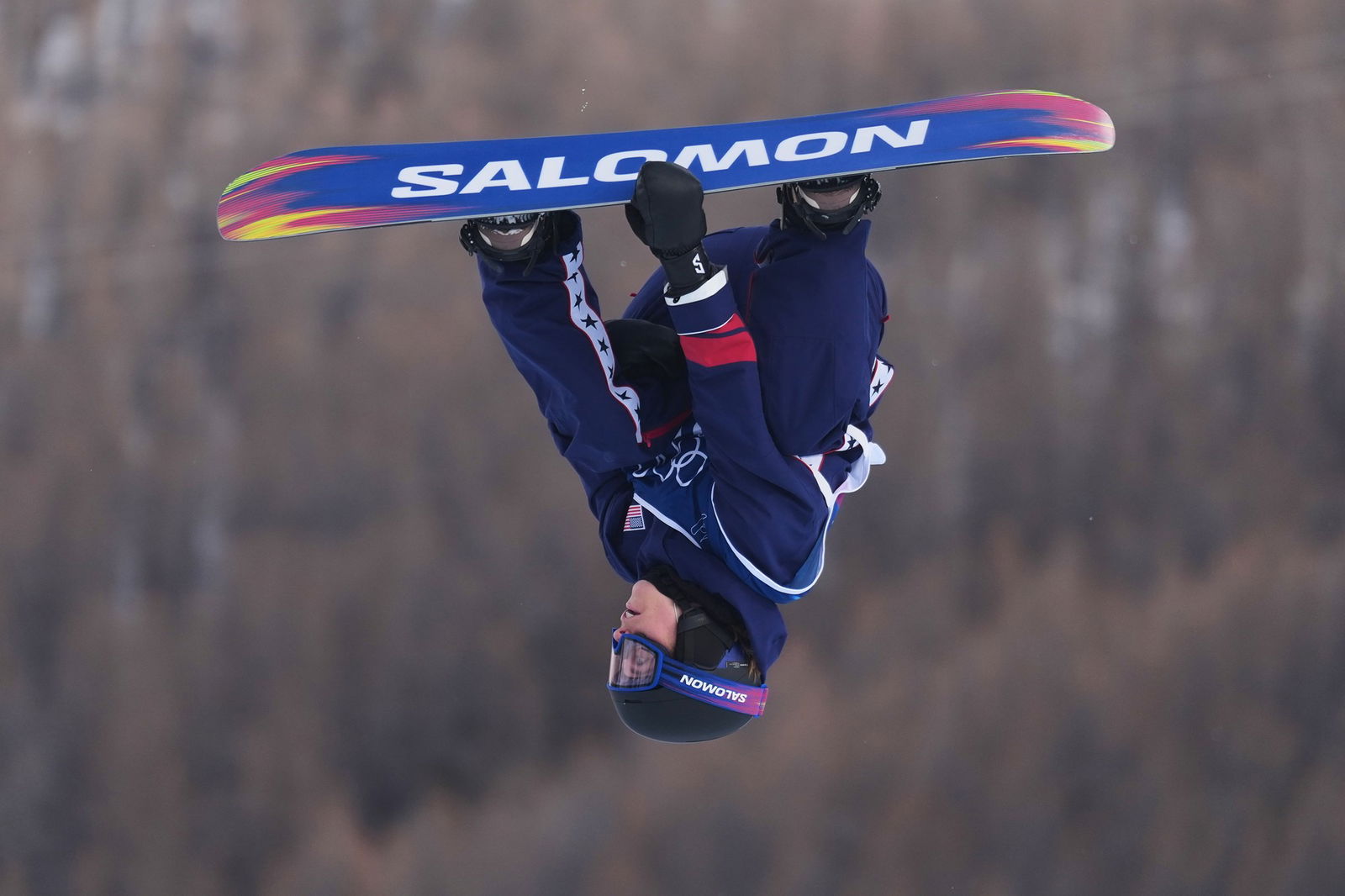 A snowboarder competes at Winter Olympics