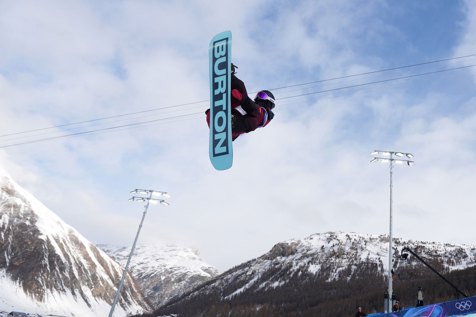 A snowboarder competes at Winter Olympics.