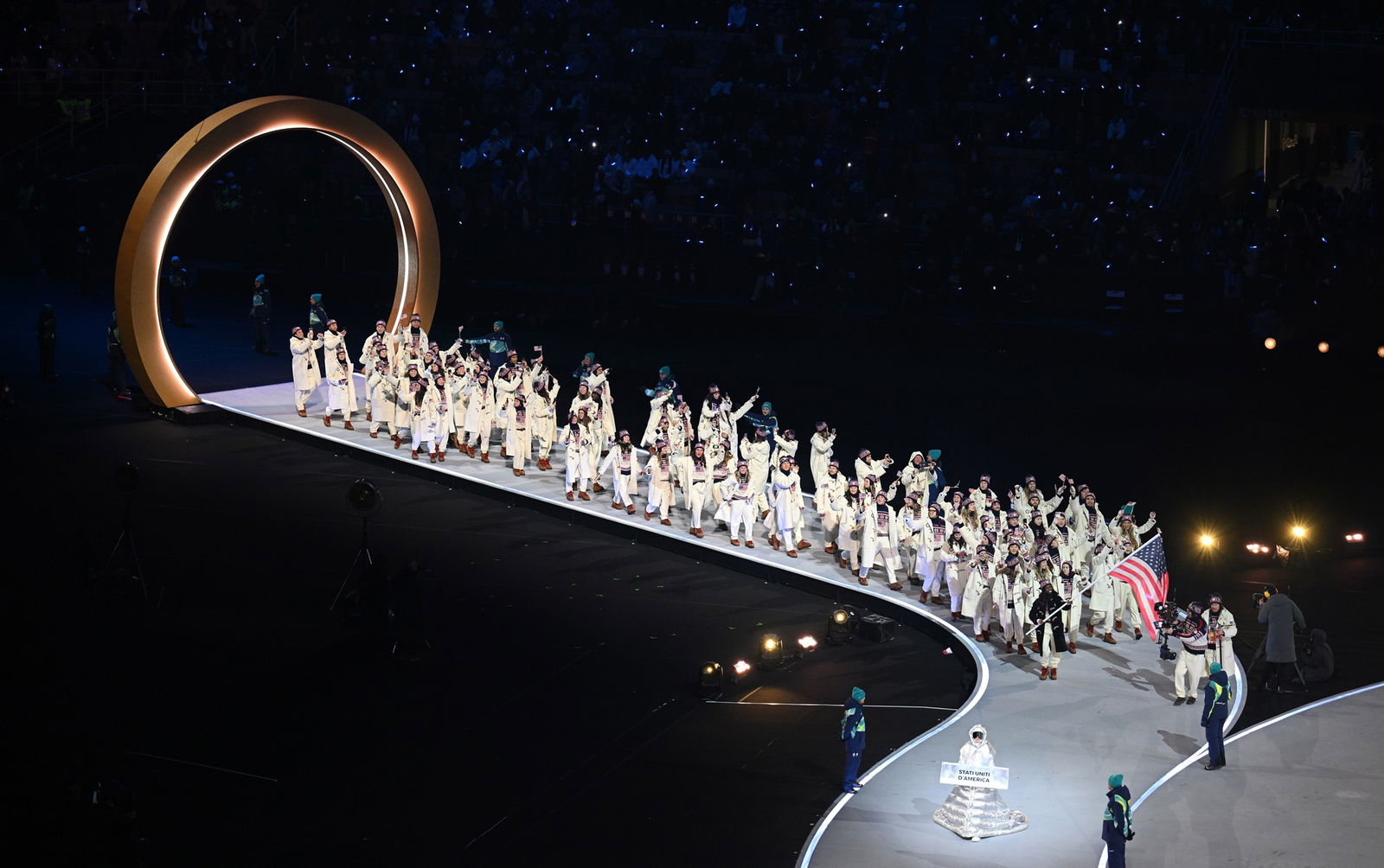 Flagbearer Erin Jackson of Team United States leads the team in the parade during the opening ceremony of the Milano Cortina 2026 Winter Olympics at San Siro Stadium on February 06, 2026 in Milan, Italy. 
