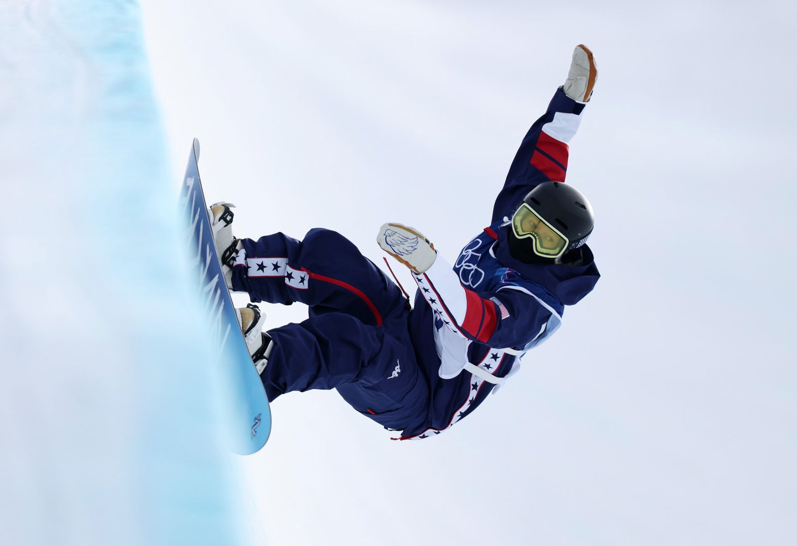 A snowboarder competes at Winter Olympics.