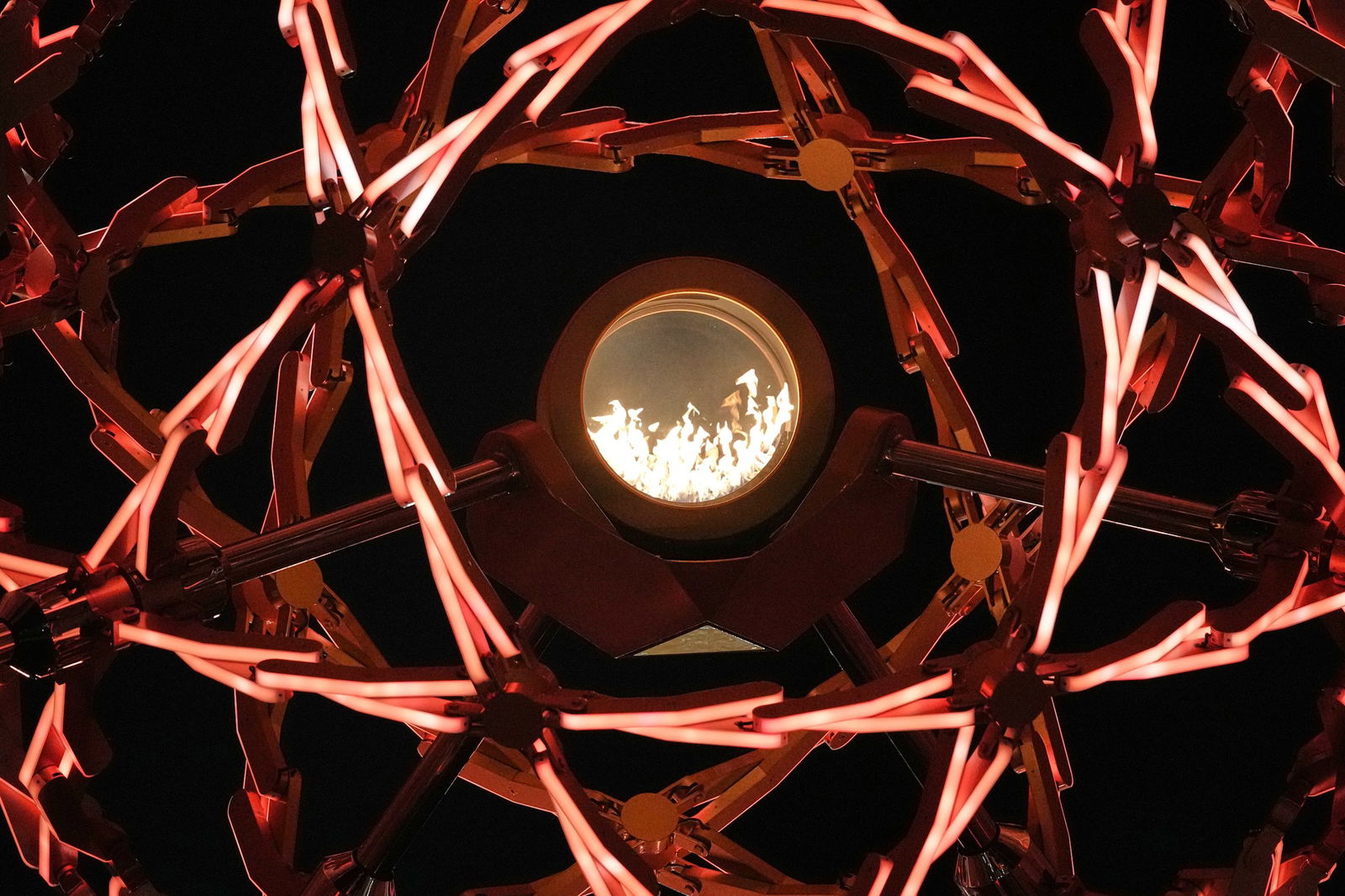 A view of the lit cauldron at the Arco della Pace during the Olympic opening ceremony at the 2026 Winter Olympics, in Milan, Italy, Friday, Feb. 6, 2026.