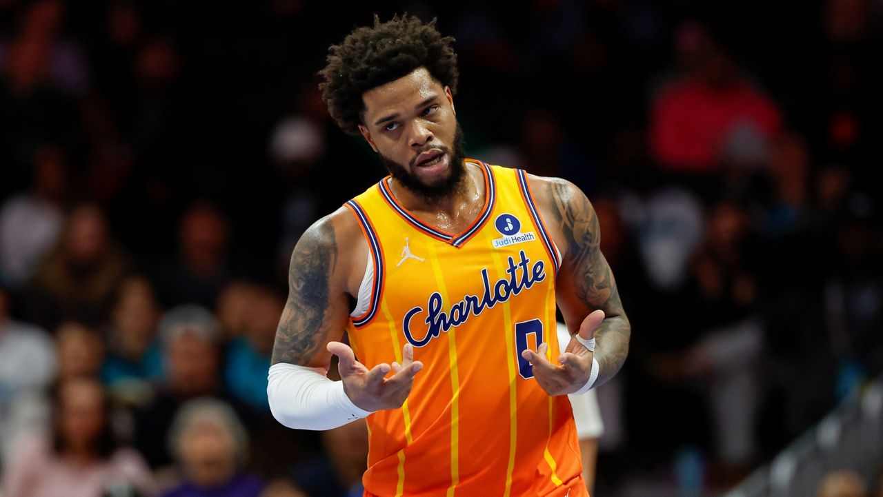 Charlotte Hornets forward Miles Bridges makes the "6-7" motion after scoring against the Washington Wizards in Charlotte, N.C., on Jan. 24, 2026. (AP File Photo/Nell Redmond)