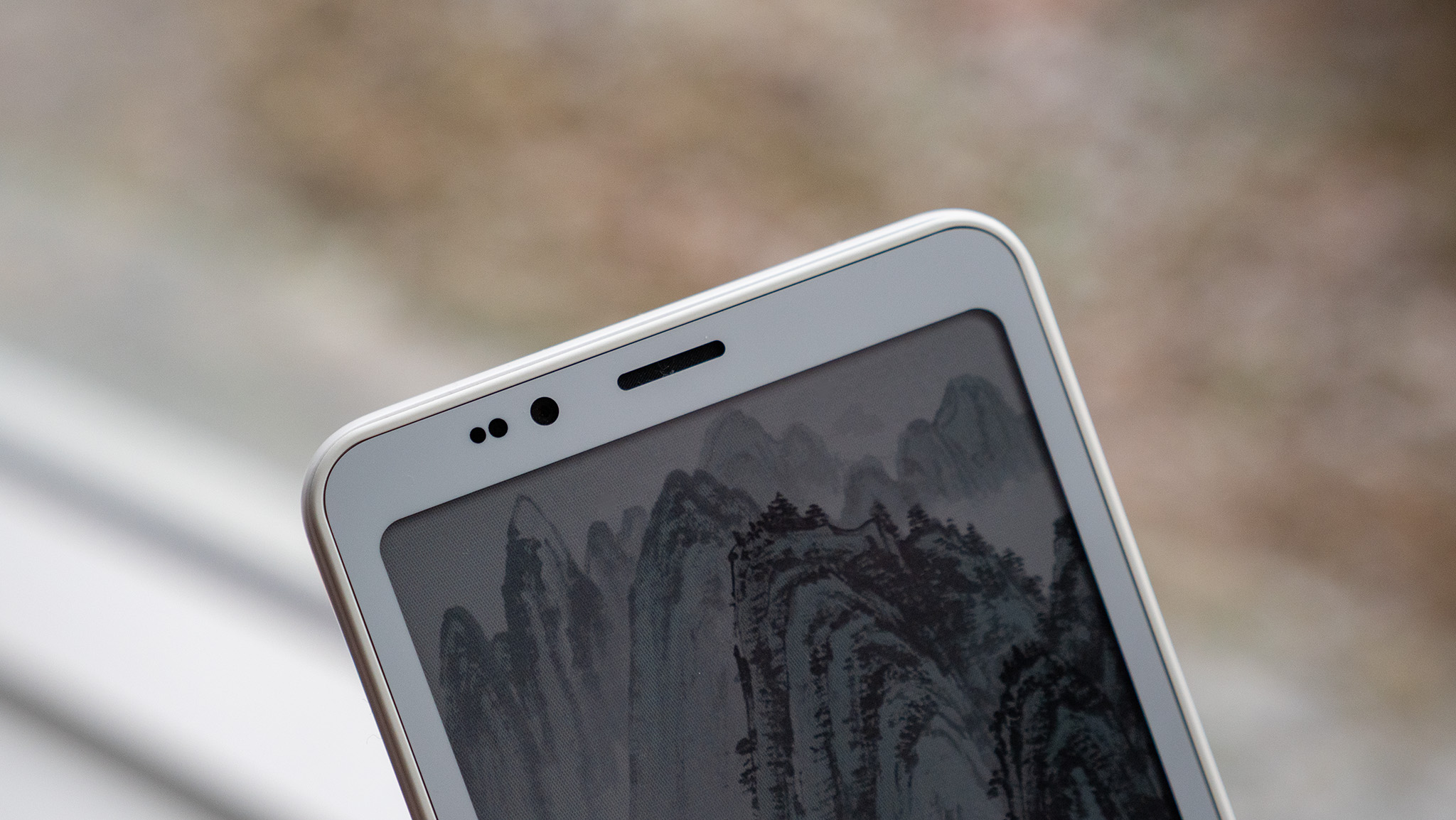 The sensors and earpiece on the top bezel of the Bigme HiBreak S Color