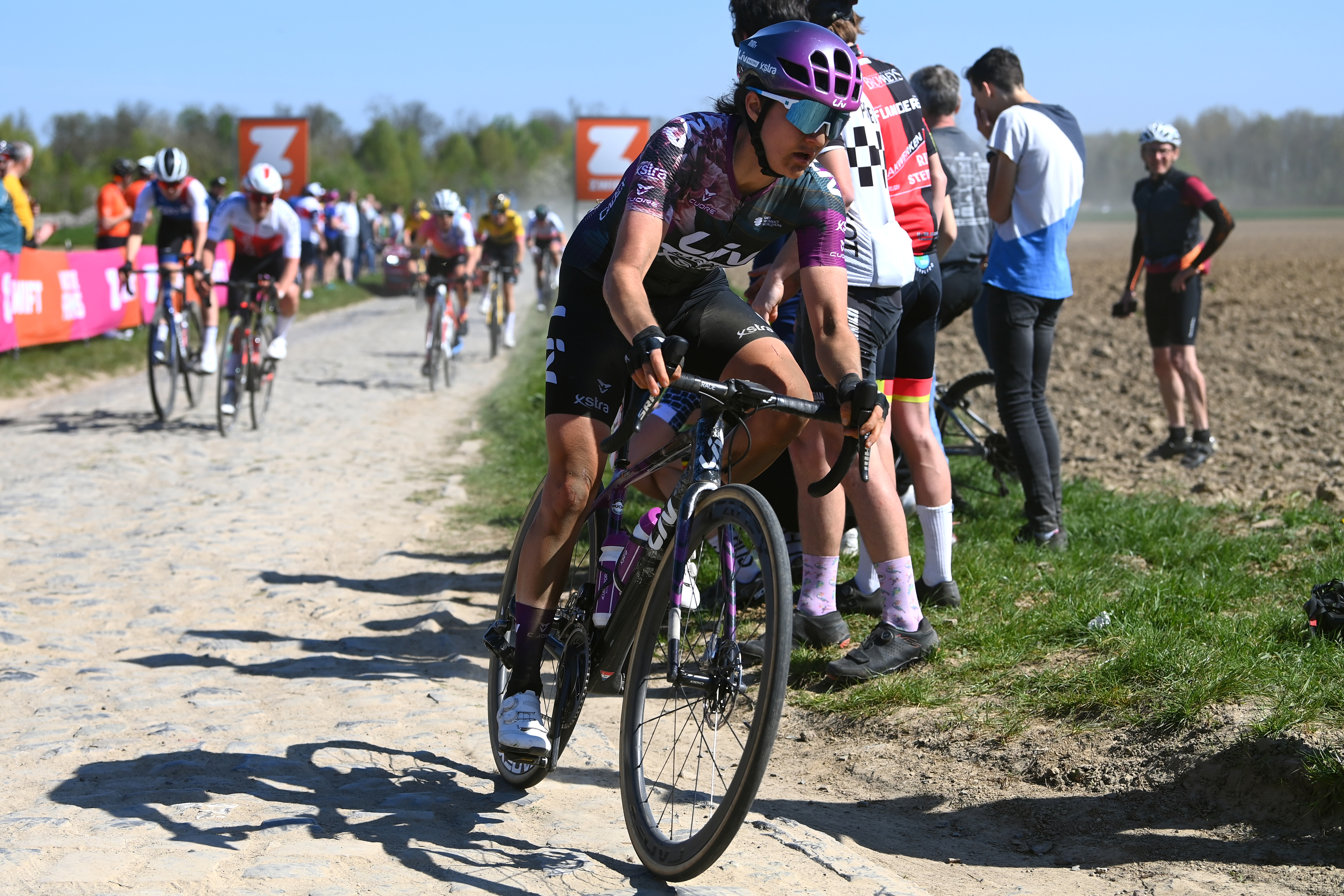 ROUBAIX, FRANCE - APRIL 16: Valerie Demey of Belgium and Team Liv Racing Xstra competes passing through a cobblestones sector during the 2nd Paris-Roubaix 2022 - Women&amp;apos;s Elite a 124,7km one day race from Denain to Roubaix / #ParisRoubaixFemmes / #ParisRoubaix / on April 16, 2022 in Roubaix, France. (Photo by Tim de Waele/Getty Images)