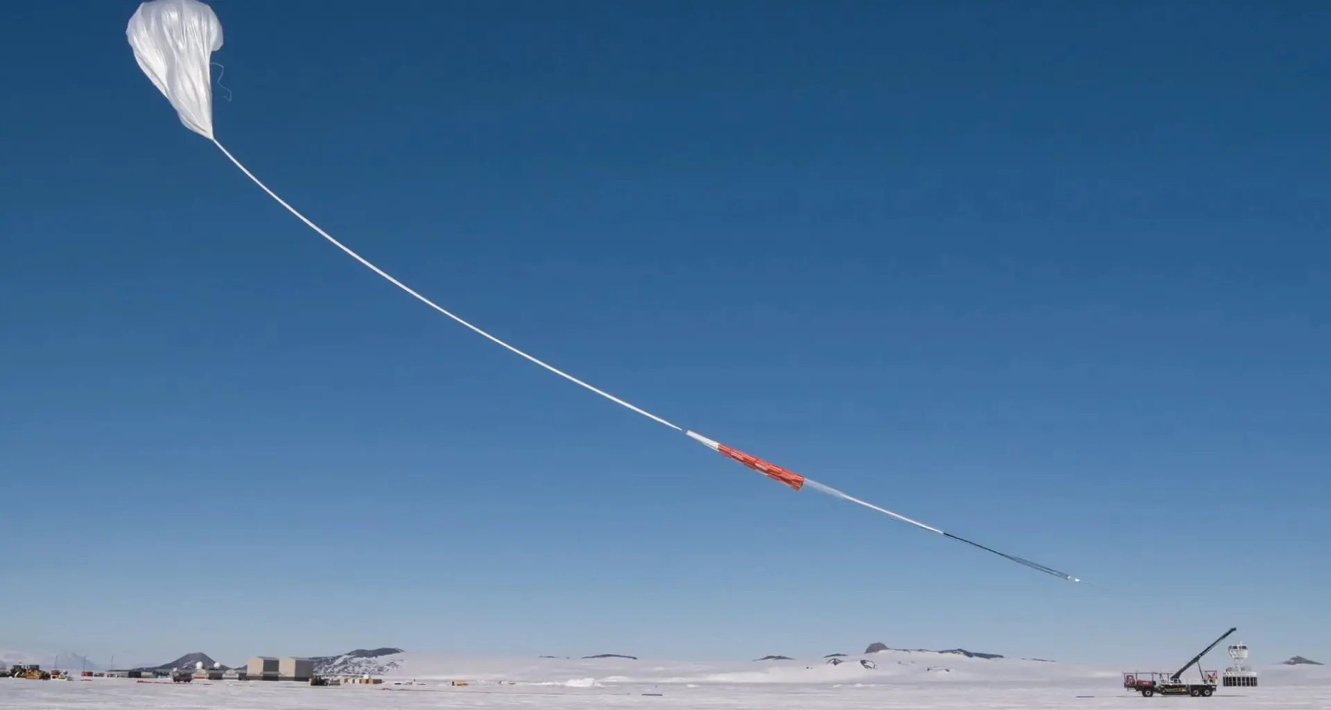 A scientific balloon starts its ascent into the air as it prepares to launch carrying NASA’s Payload for Ultrahigh Energy Observations (PUEO) mission (Credit : NASA/Scott Battaion)