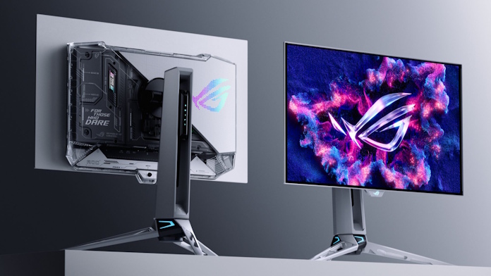 Two ROG Swift OLED PG27AQWP-W gaming monitors side by side on a table, showing the front and back of the monitors