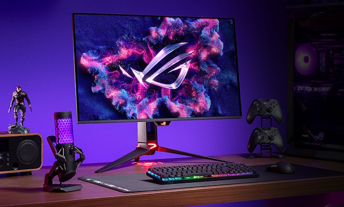 The ROG Swift OLED PG32UCDM Gen 3 gaming monitor on a desk with other ROG gaming gear