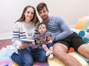 Conor Garland with wife Meghan and their 10-month-old son Quinton at their home in Vancouver