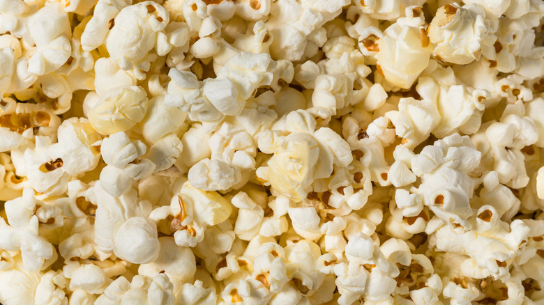 Popcorn with salt as background