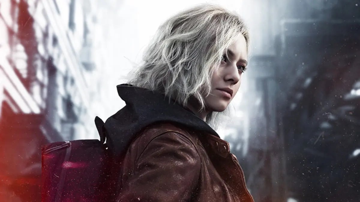 Grace looks over her shoulder while walking.