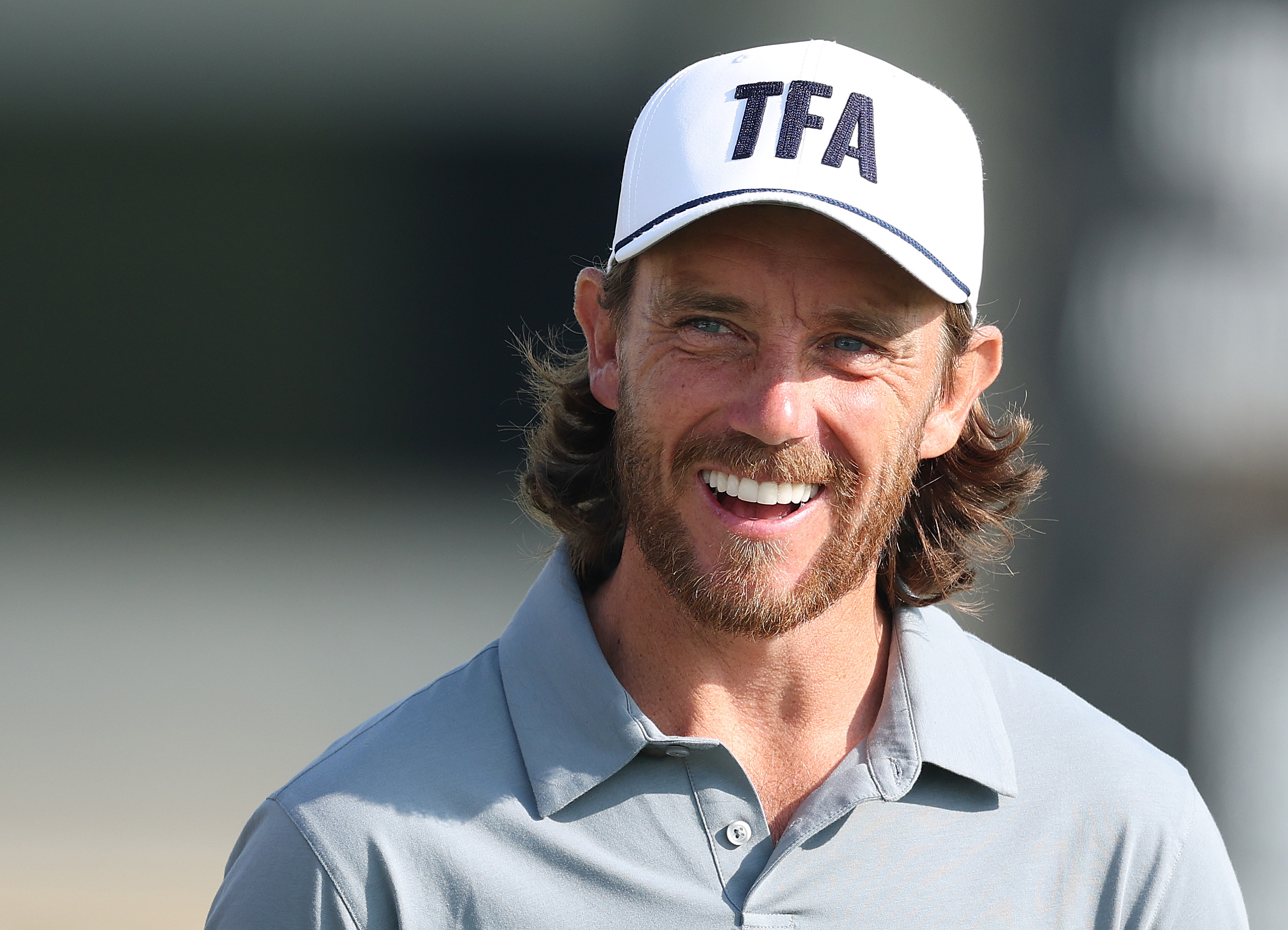 Tommy Fleetwood smiles at the Dubai Invitational
