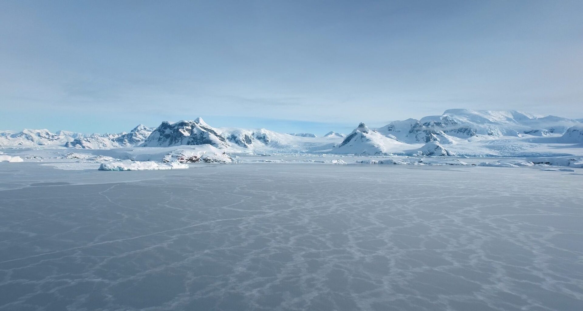 Warming ice awakens microbes that could speed climate change