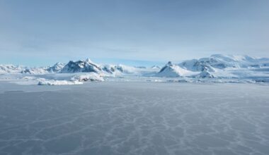 Warming ice awakens microbes that could speed climate change