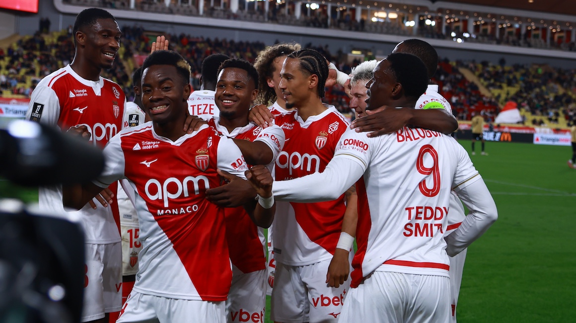 Adingra celebrates in front of the cameras and with his teammates after scoring Monaco second goal in a 2-0 win over Angers