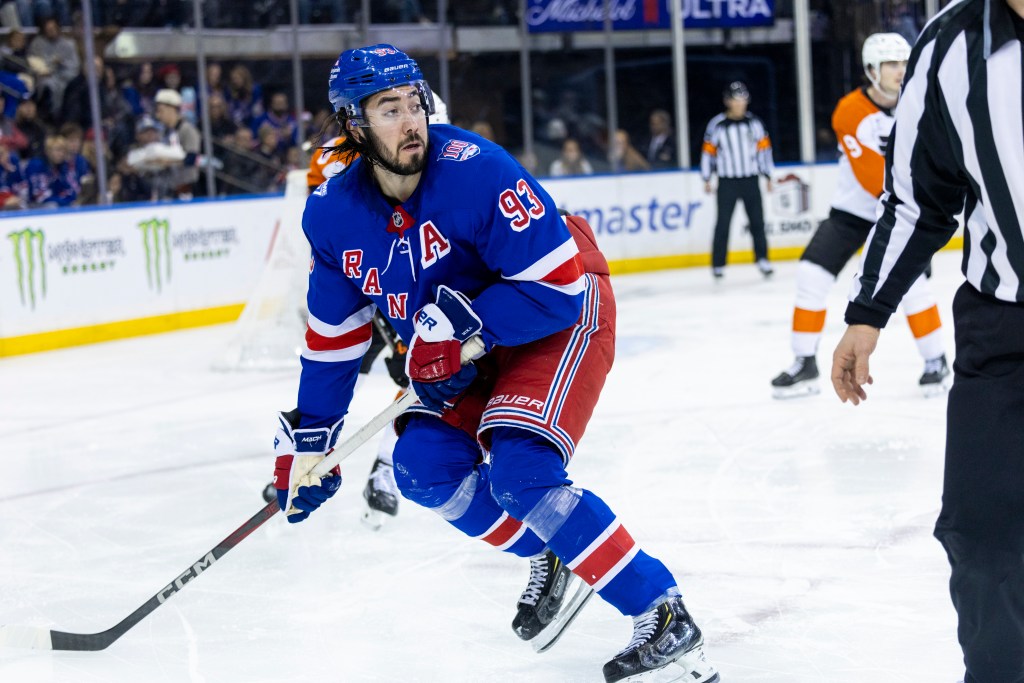 New York Rangers center Mika Zibanejad (93) skates down the ice.