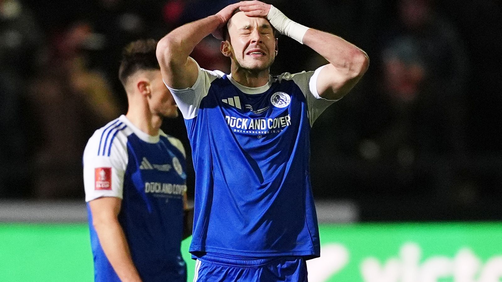 Sam Heathcote shows his despair after his own goal saw Brentford beat Macclesfield in the FA Cup fourth round